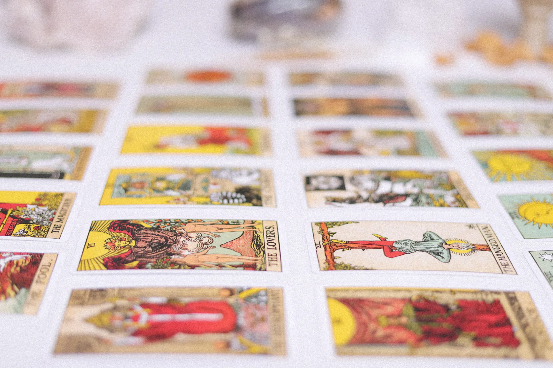 assortment of intuitive tarot reading cards highlighting the lovers card